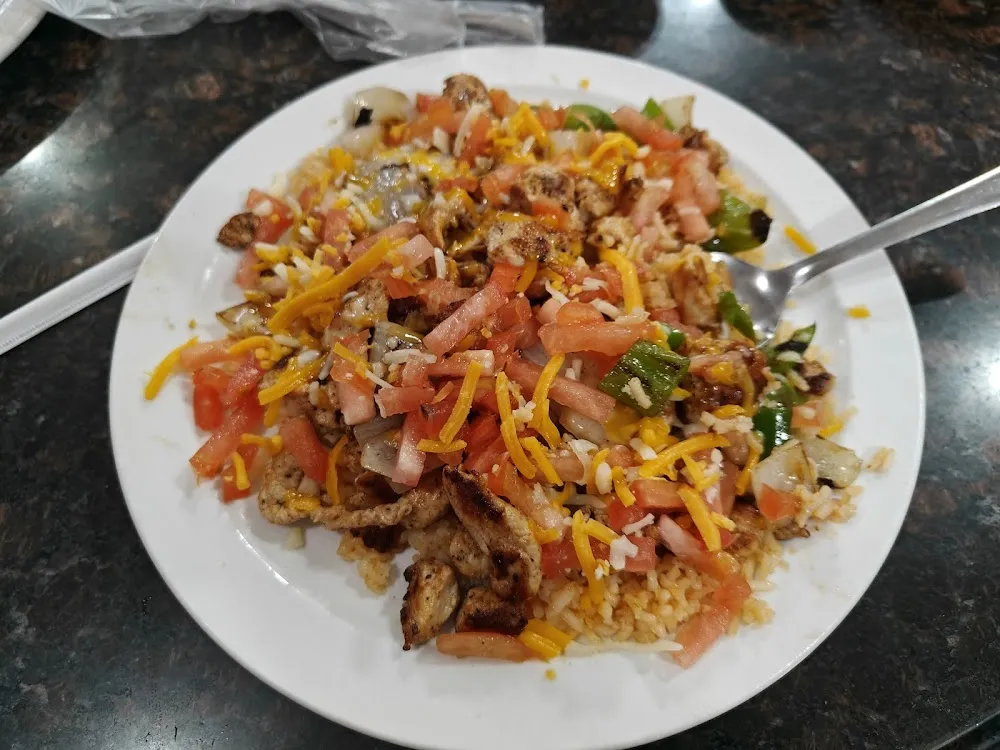 Grilled Chicken on Bed of Rice